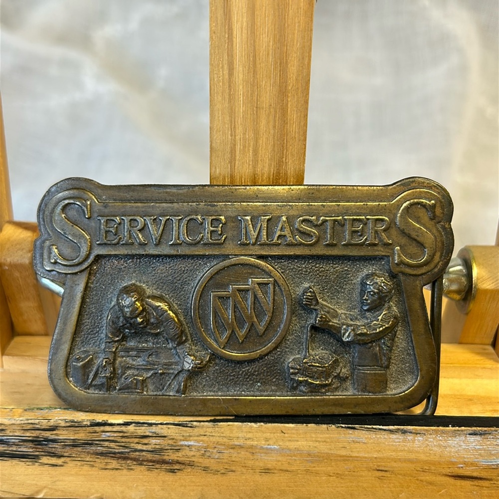 Service Master belt buckle with stand limited edition
